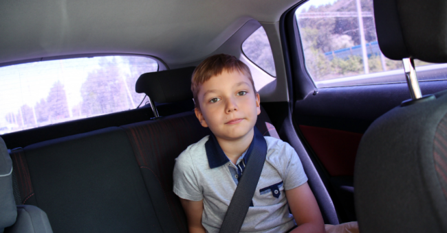 Community based services from ESP - photo pictures a child safely strapped in car